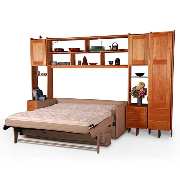 Sofa bed surrounding cabinets shown with bed open