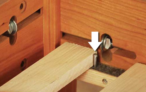 Bed slat behind pin